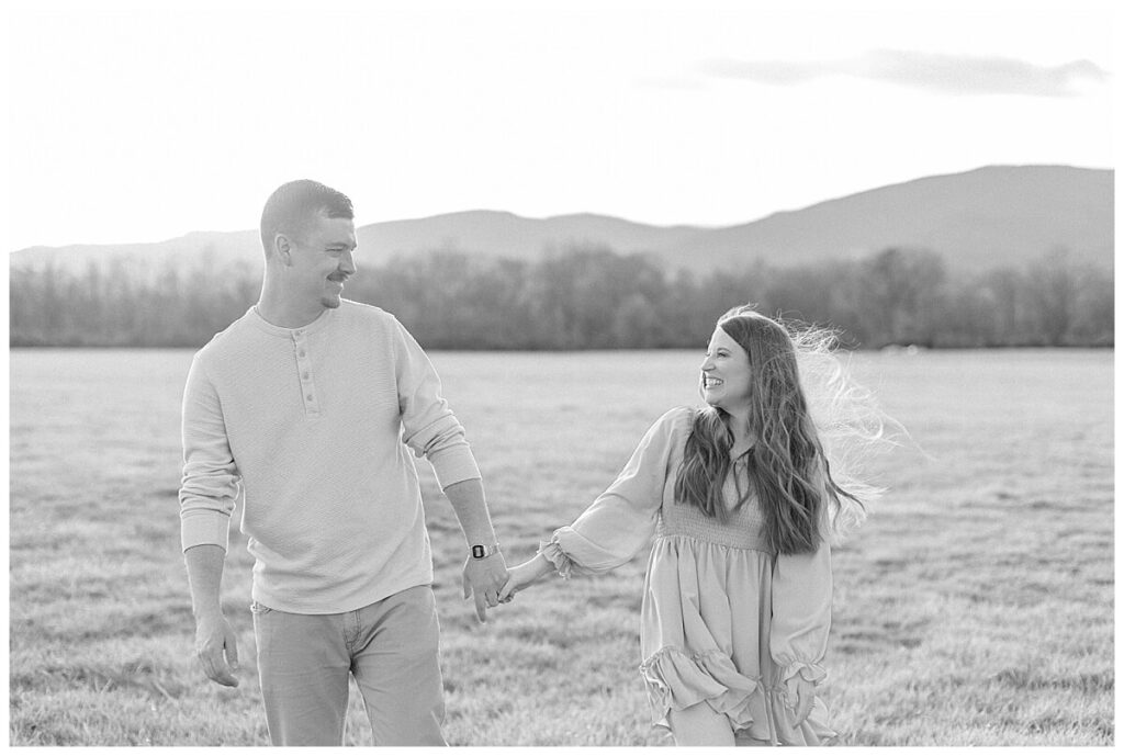 Couple taking engagement photos for wedding at Greenhill Park in Roanoke, Virginia 