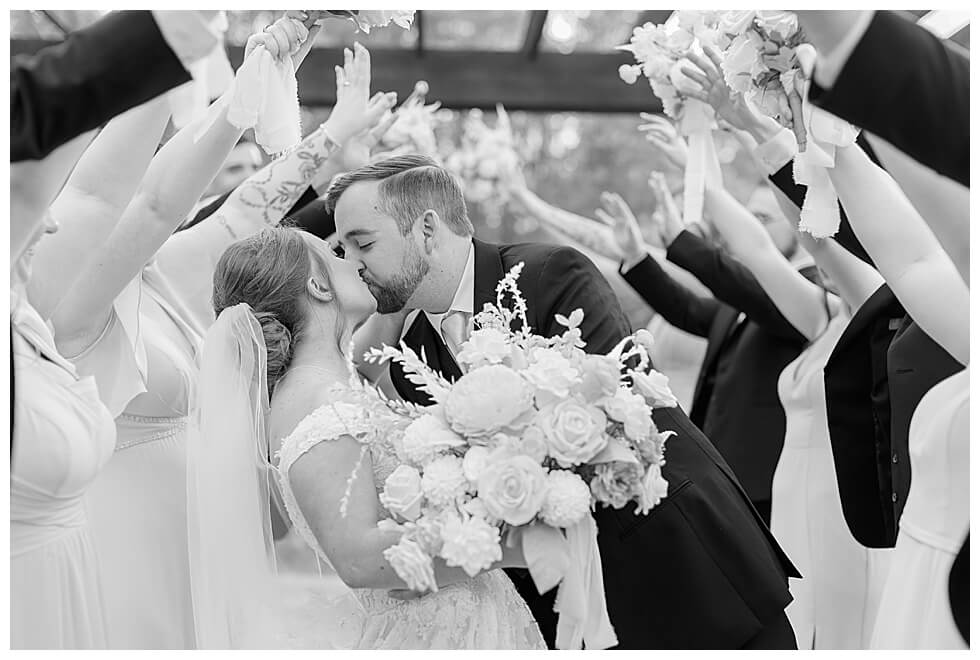 Bride and Groom Kissing at The Pavilion At Carriage Farm