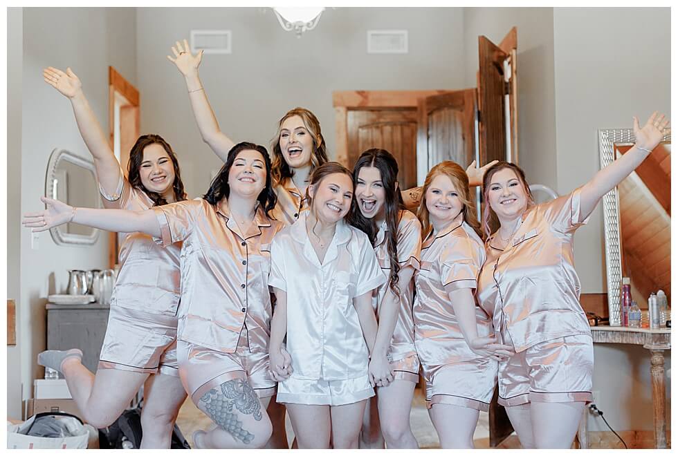 Bride Celebrating with Bridesmaids at The Pavilion At Carriage Farm