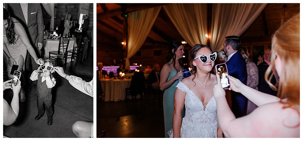 Bride wearing heart shaped glasses on the dance floor at 