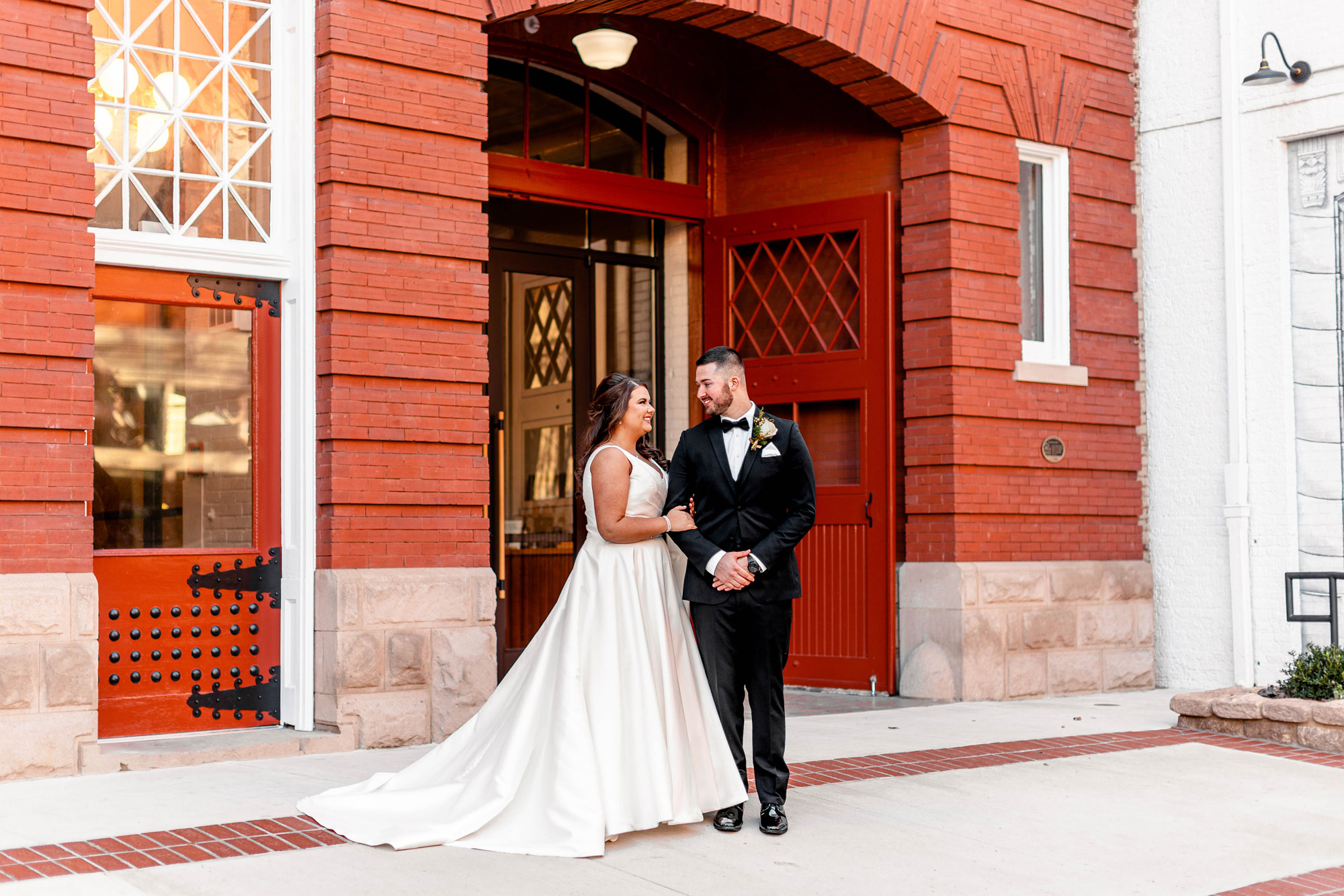 Bride and groom looking at each other 